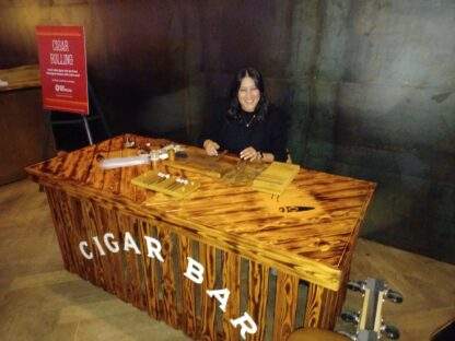 Cindy rolling cigars at the Rustic